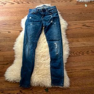 Skinny dark washed ripped jeans never worn